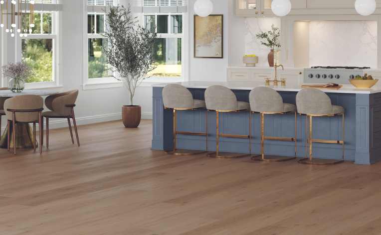 luxury vinyl flooring in kitchen with blue island